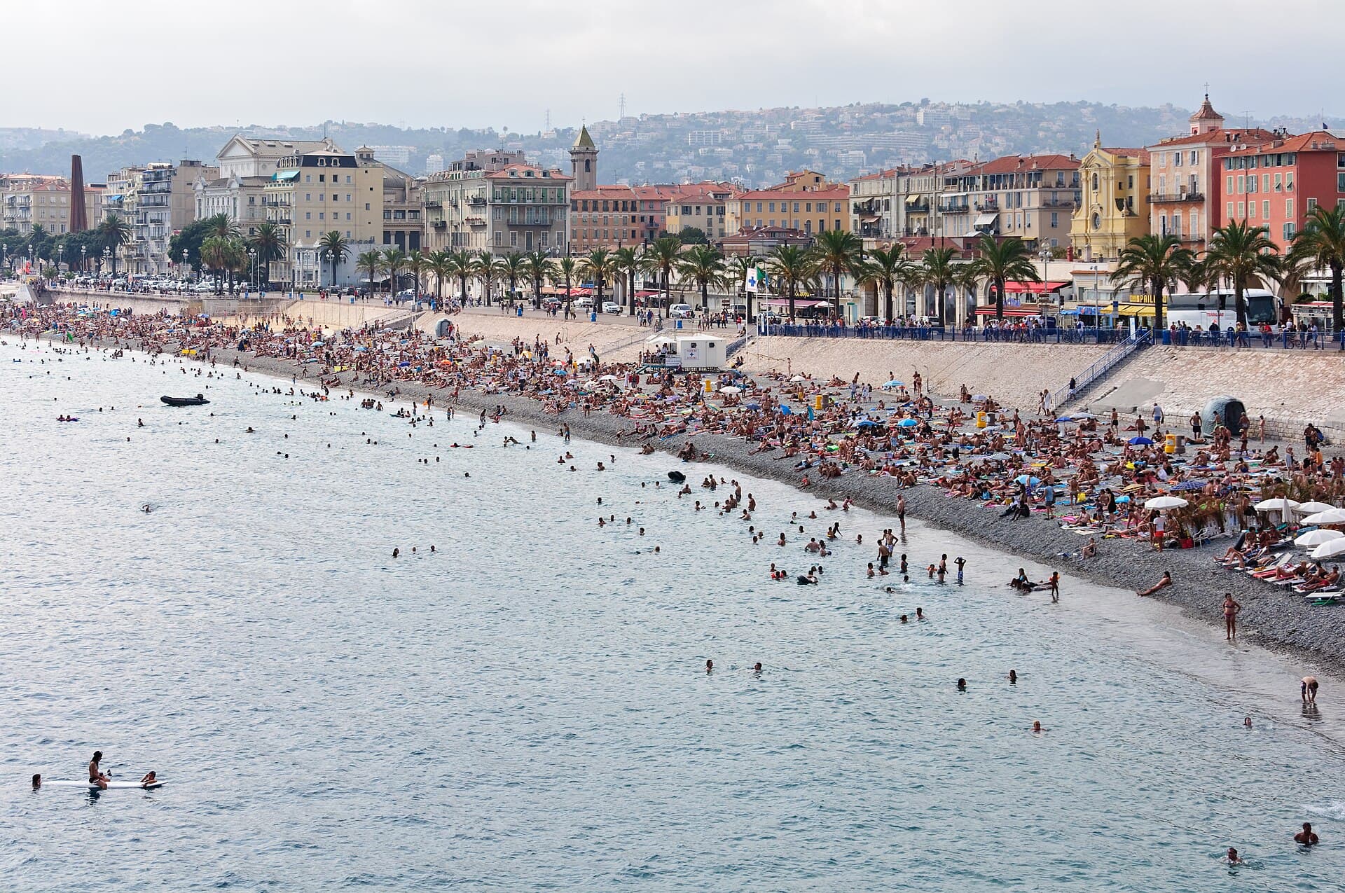 The pebble curve of the Baie des Anges along Nice's Promenade des Anglais