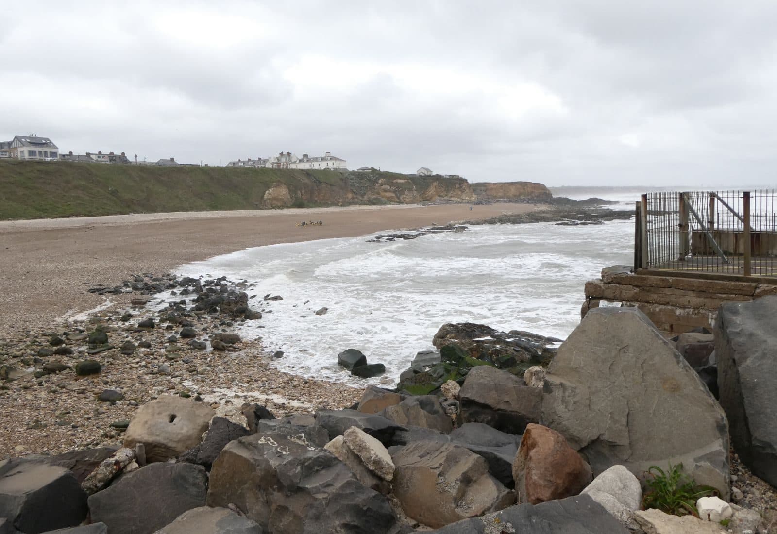 Winter surf working a sea glass beach